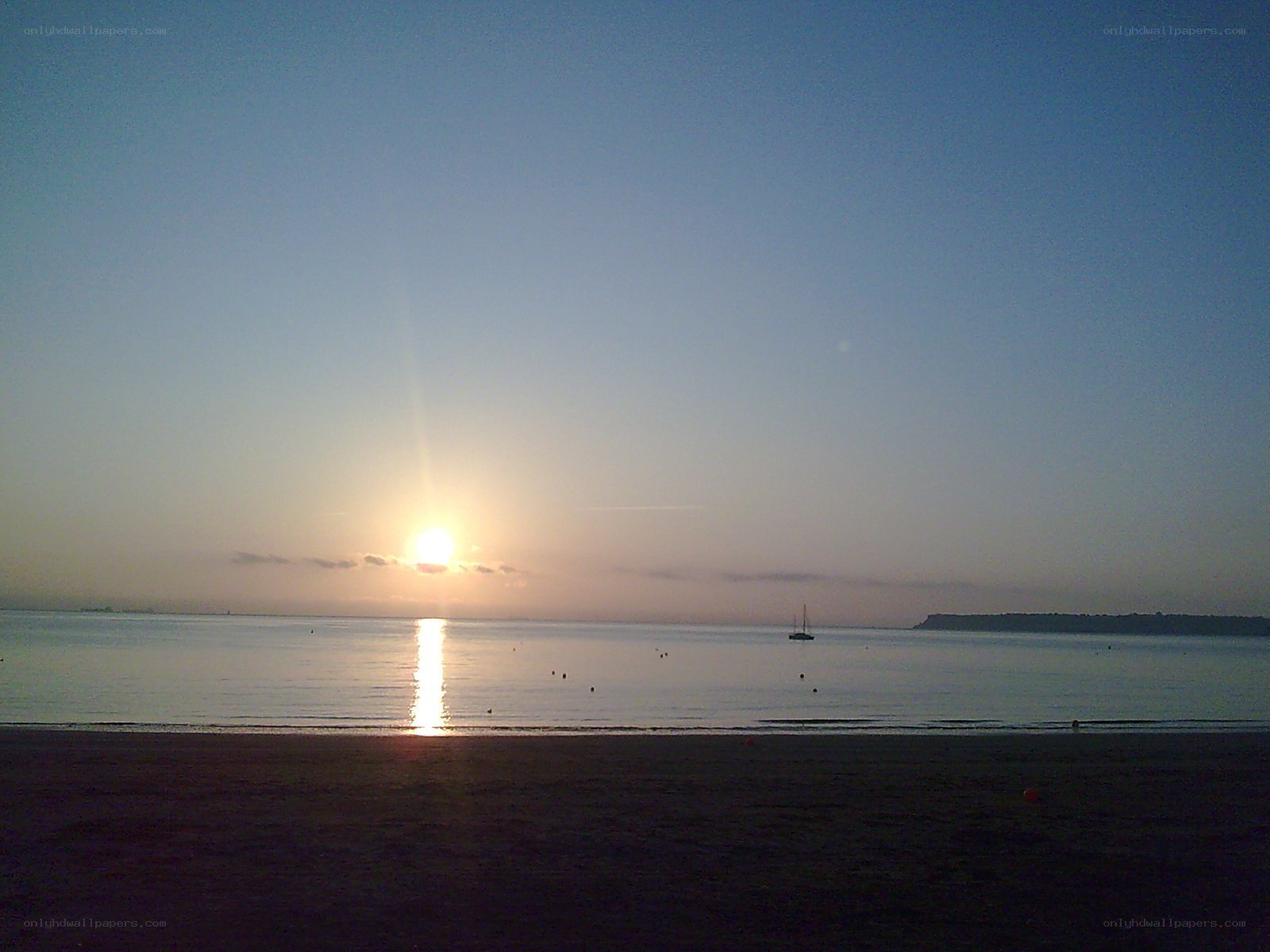 Sunset over calm sea