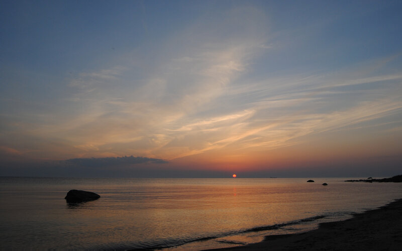 Sunset over calm sea