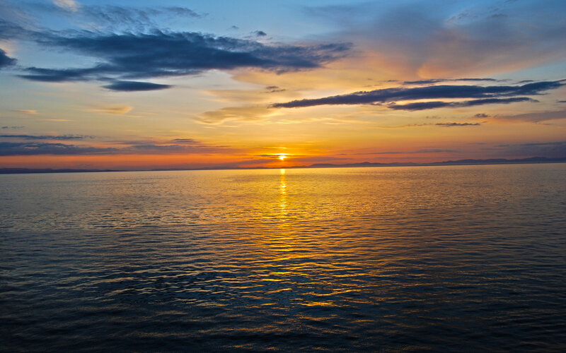 Sunset over calm sea