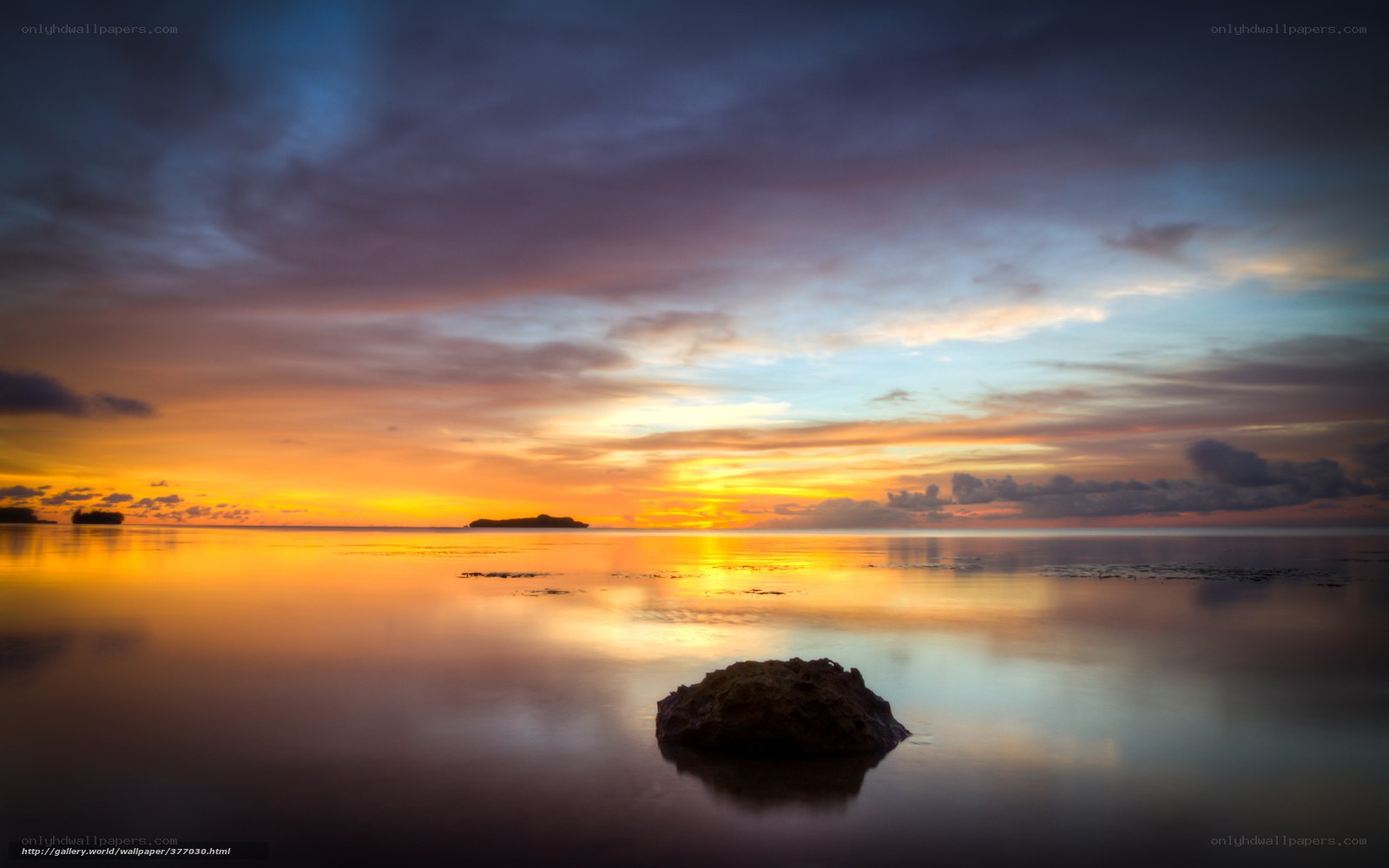 Sunset over calm sea