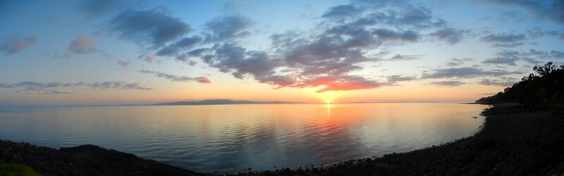 Sunset over Calm Sea — Blue, Serene, Photograph, Clouds