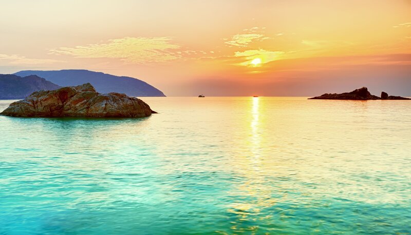 Sunset over Calm Sea — Orange, Serene, Photograph, Rocks