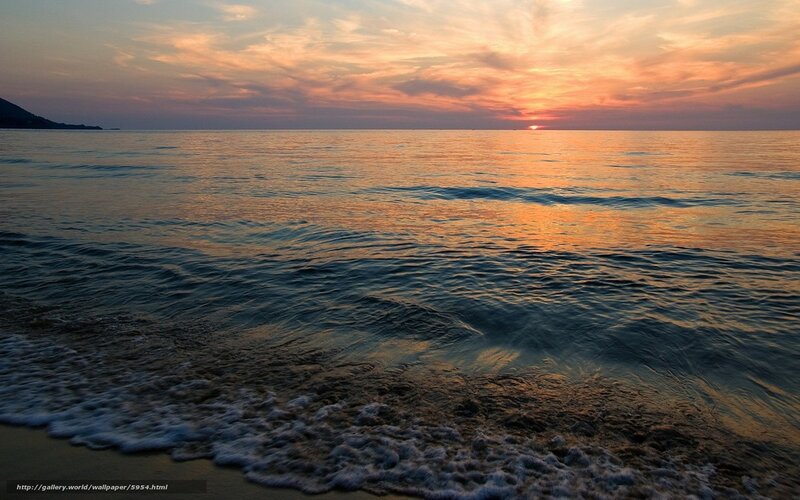 sunset over calm sea