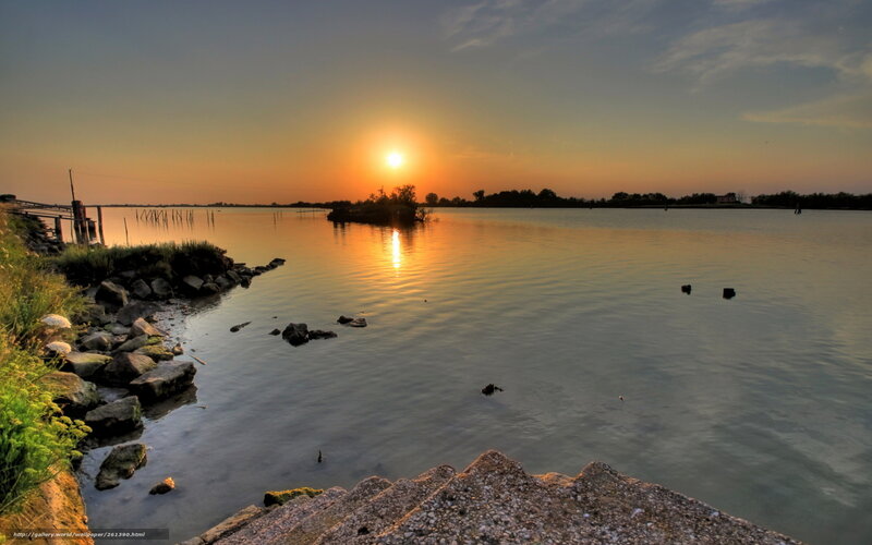 Sunset over calm water