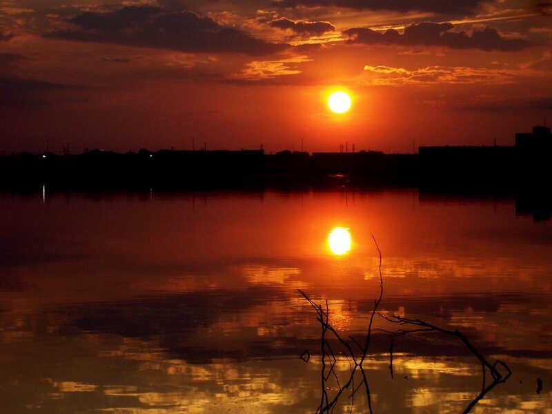 sunset over calm water