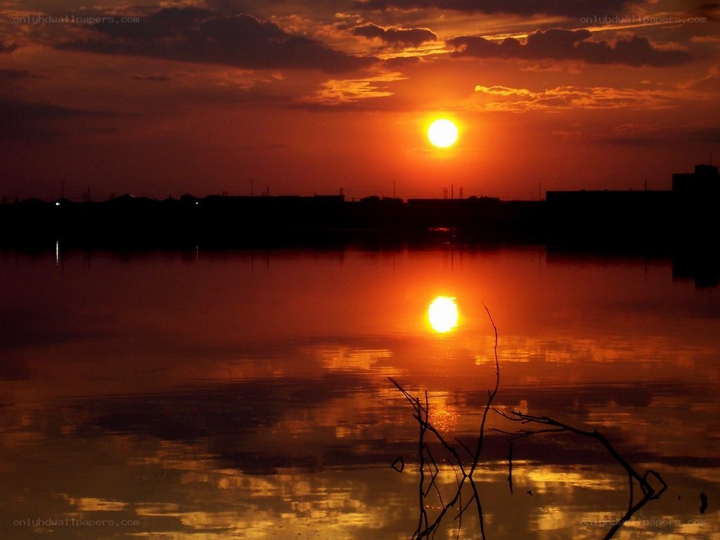 sunset over calm water