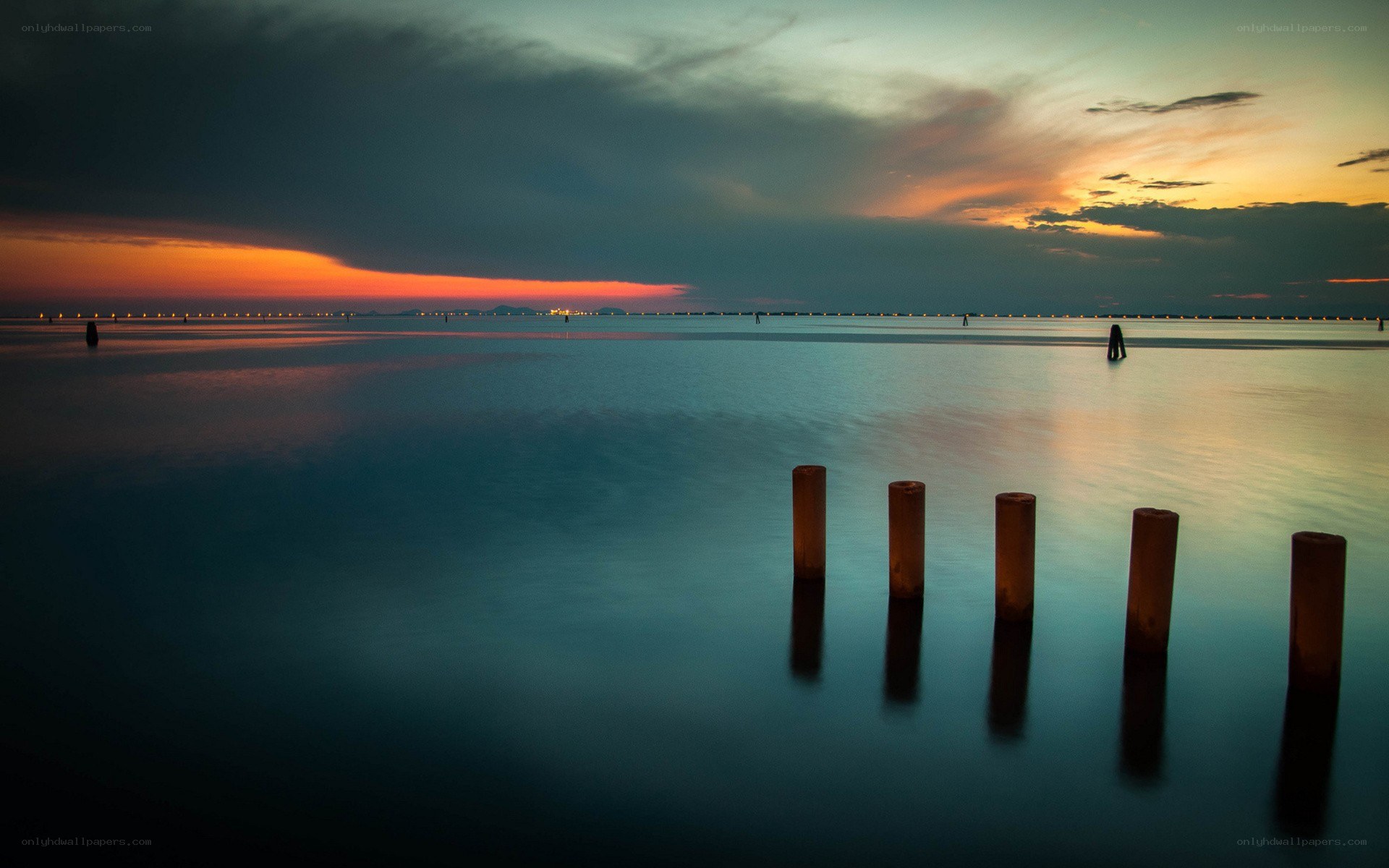 sunset over calm water