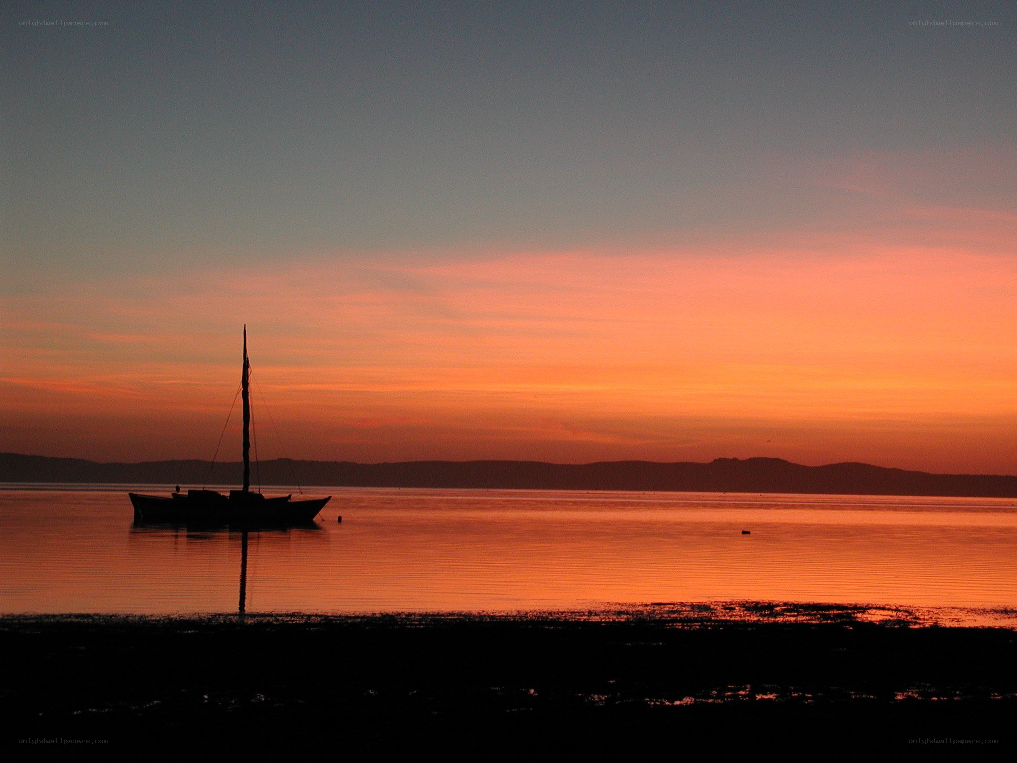 sunset over calm water