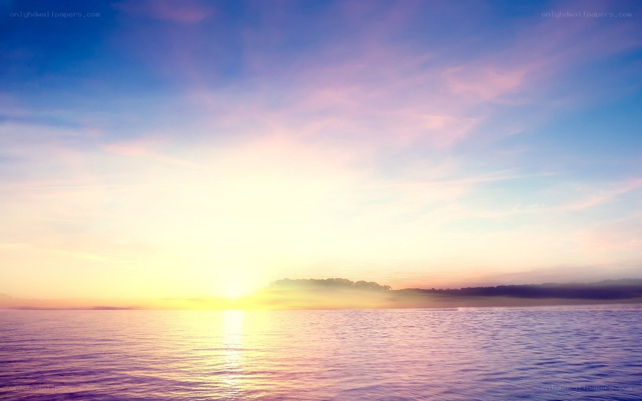 sunset over calm water