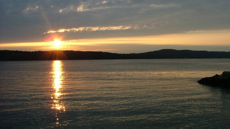 sunset over calm water