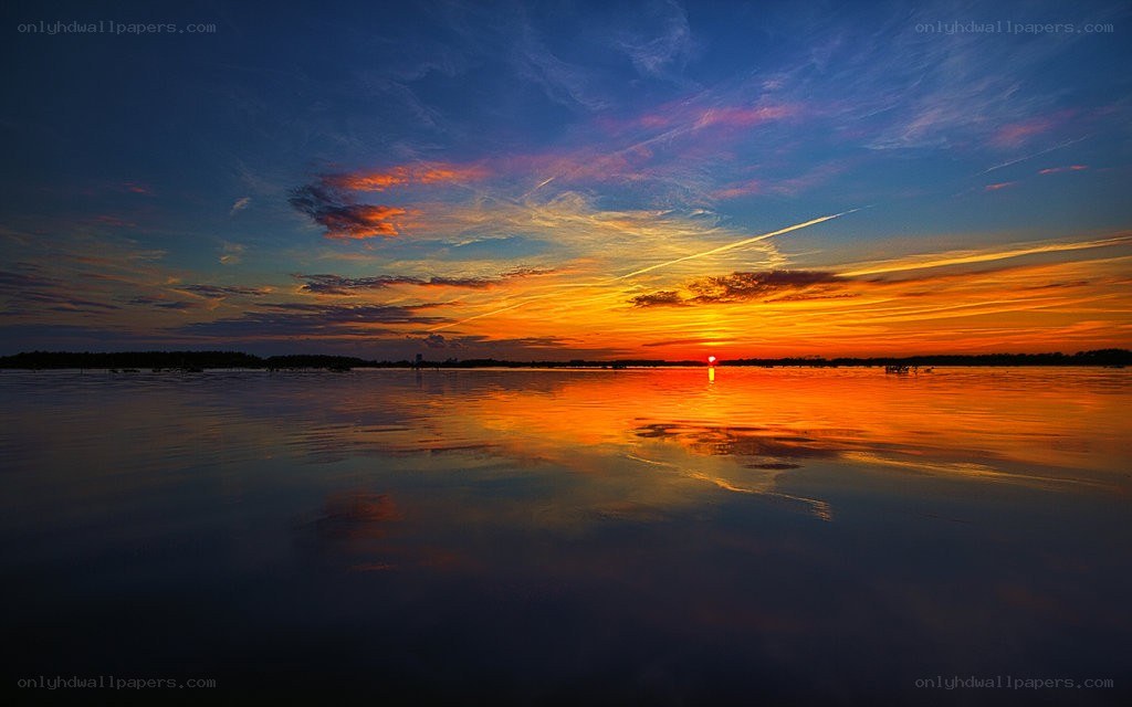 Sunset over calm water