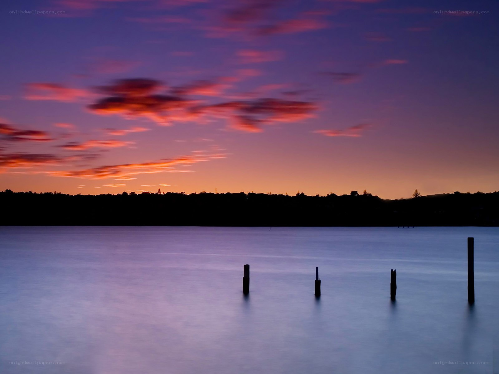 Sunset over calm water