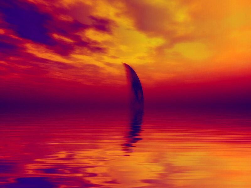 sunset over calm water