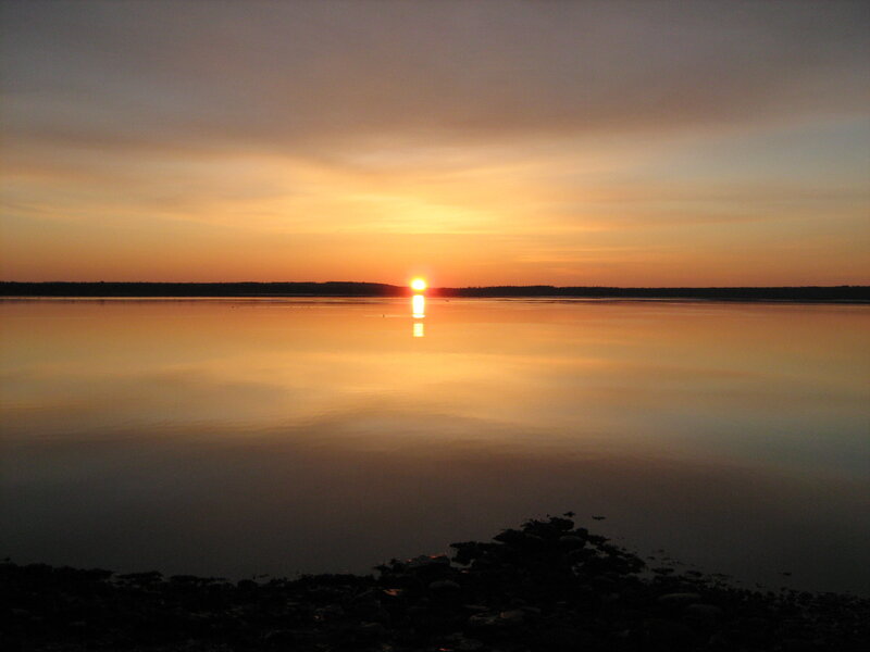 Sunset over calm water