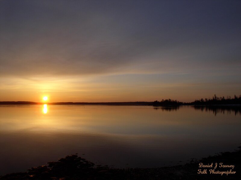 sunset over calm water