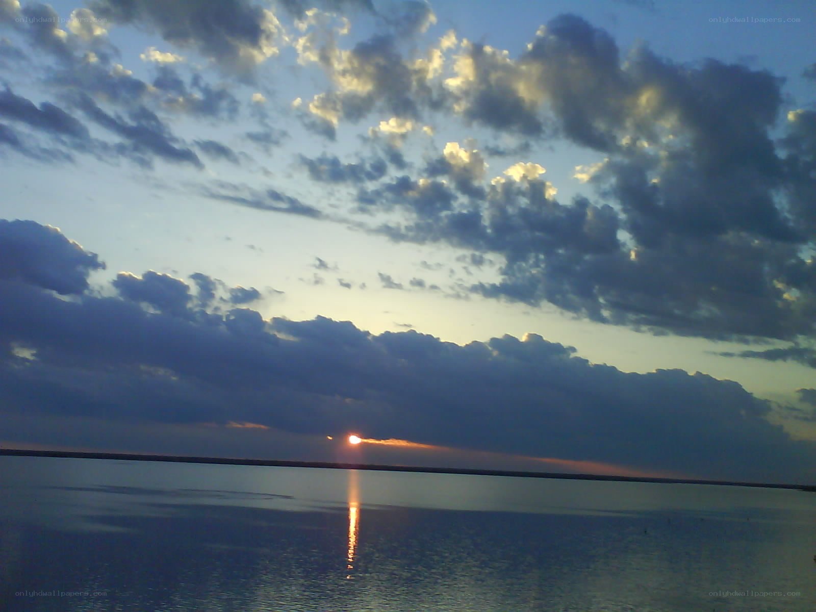 Sunset over calm water
