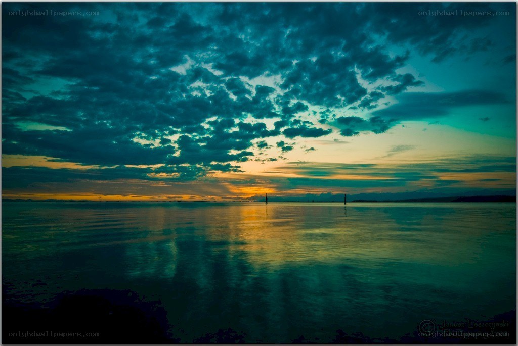Sunset over calm water