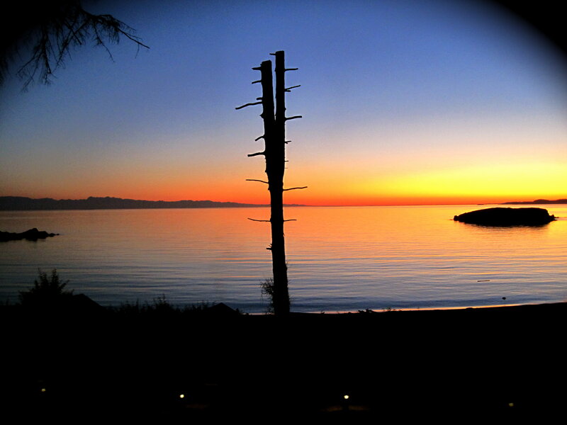 sunset over calm water