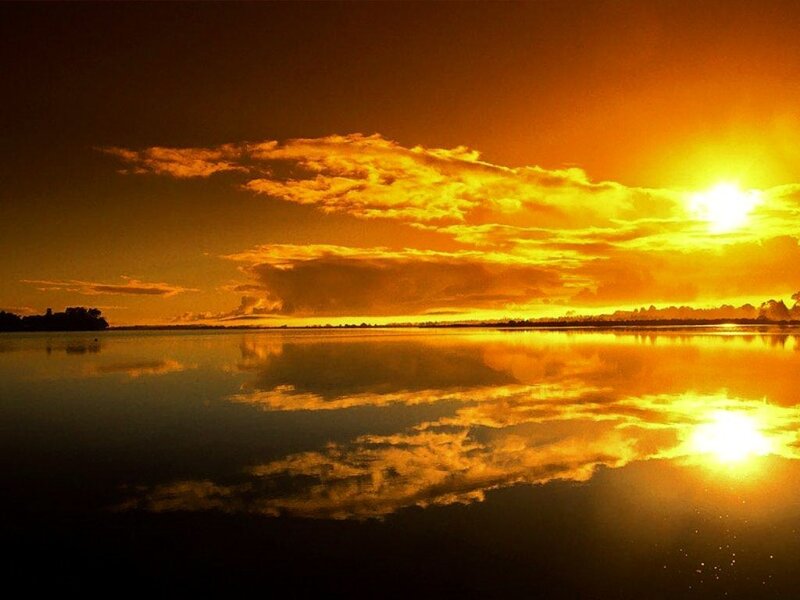 Sunset over calm water