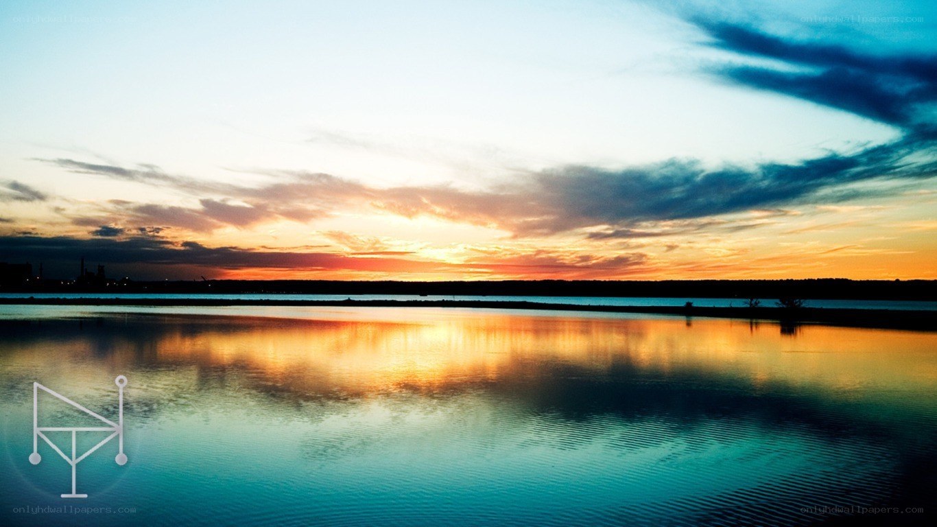 sunset over calm water