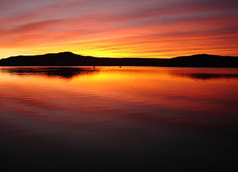 Sunset over calm water