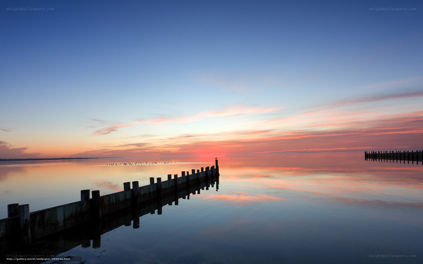 Sunset over calm water