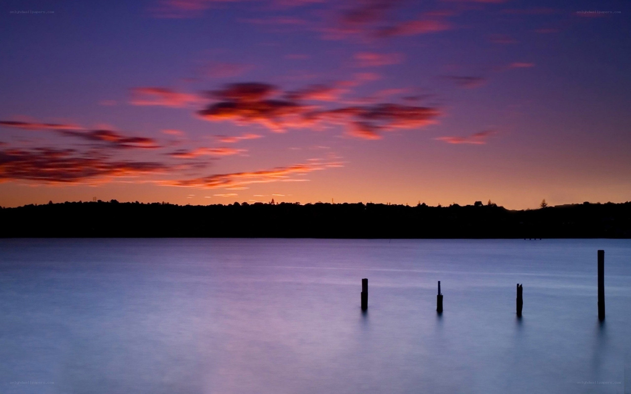 Sunset over calm water