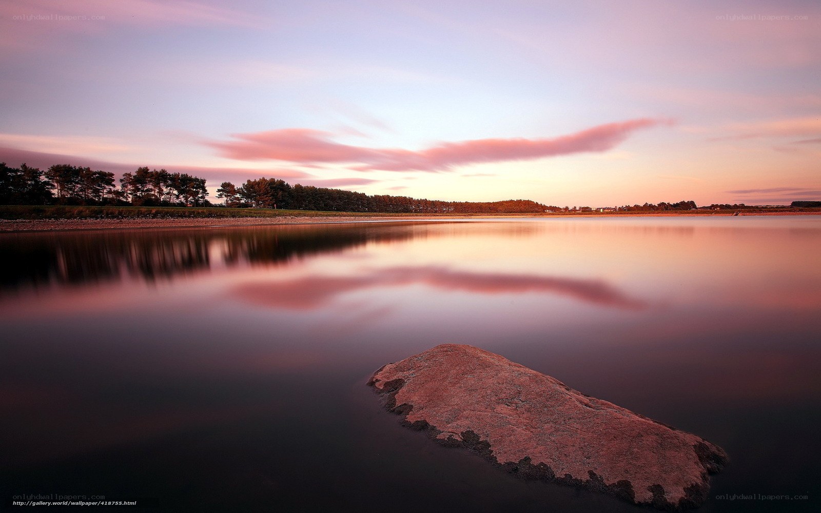 Sunset over calm water