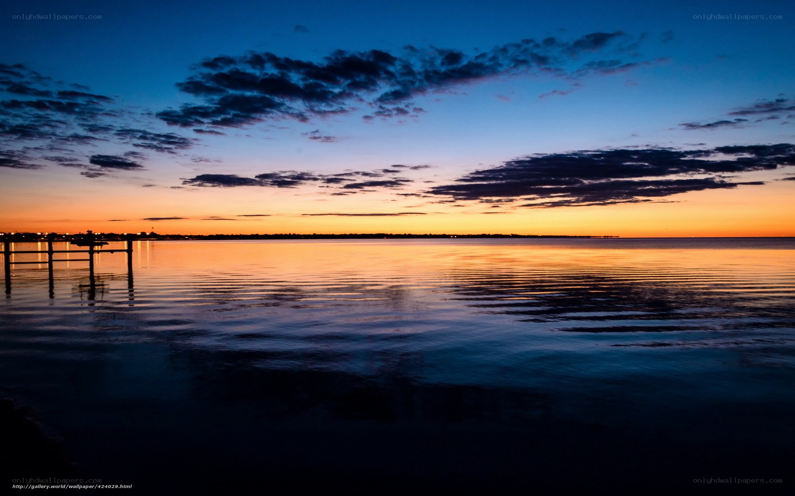 sunset over calm water