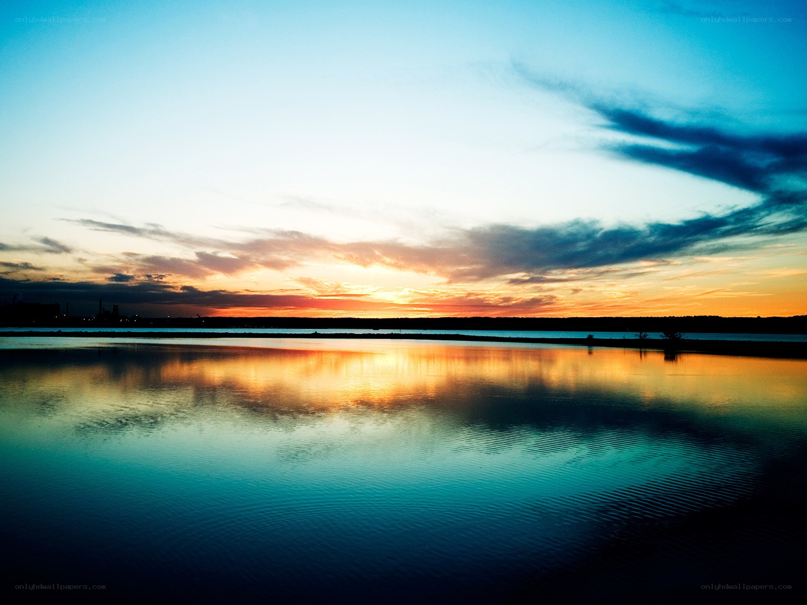 Sunset over calm water