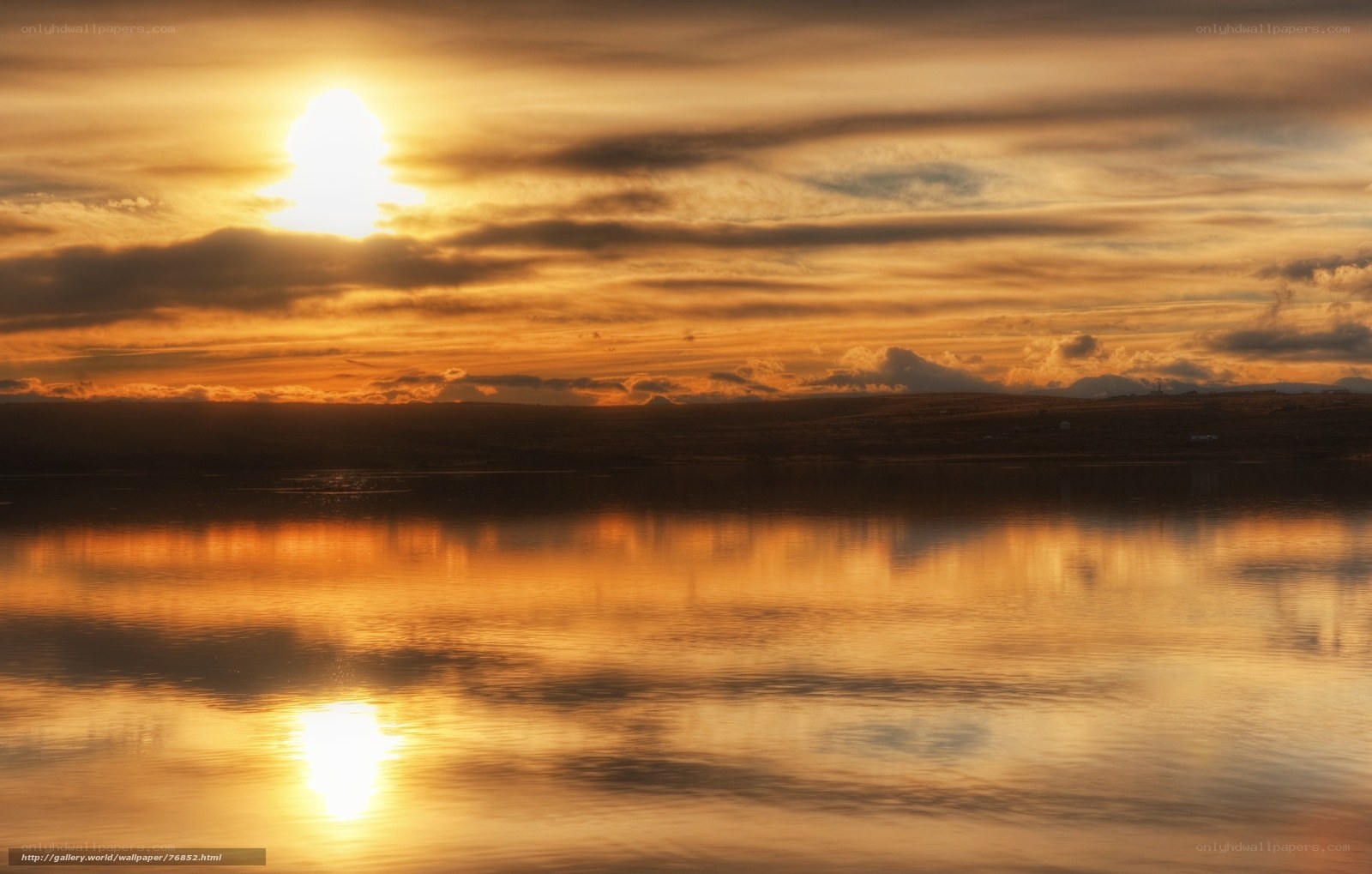 sunset over calm water