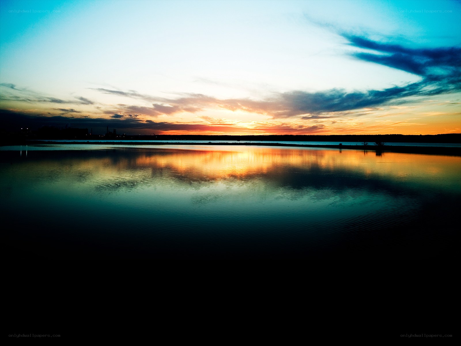 Sunset over calm water