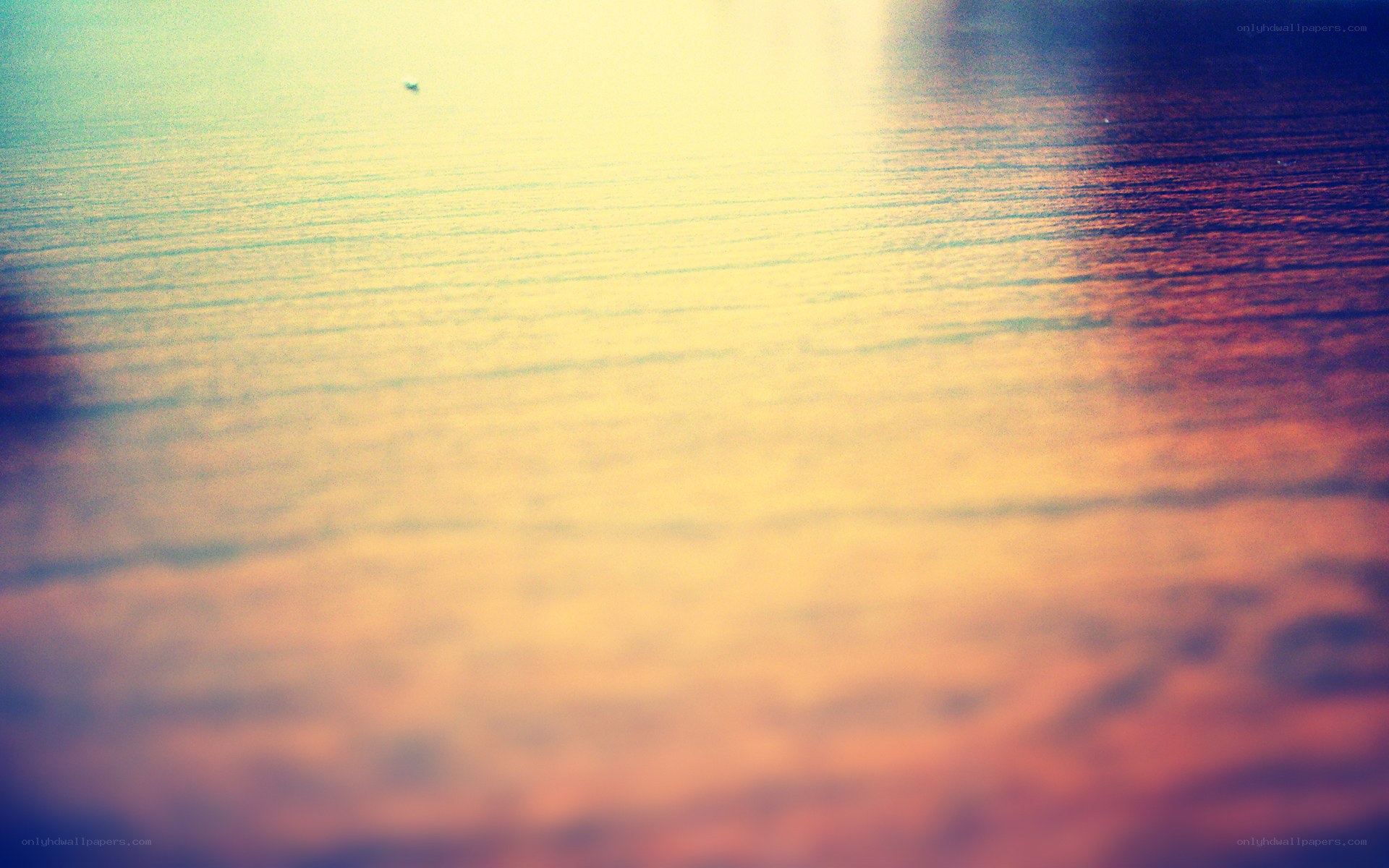 sunset over calm water