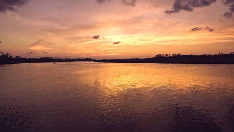 sunset over calm water