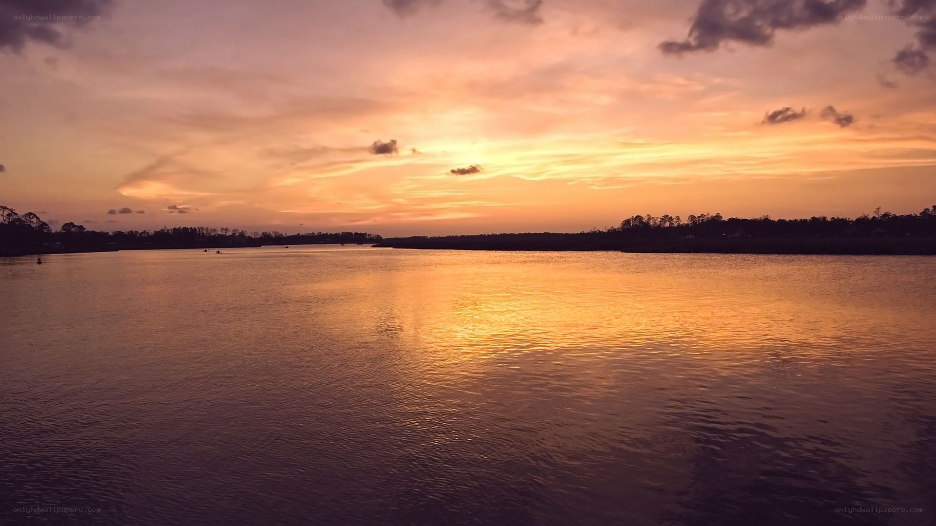 sunset over calm water