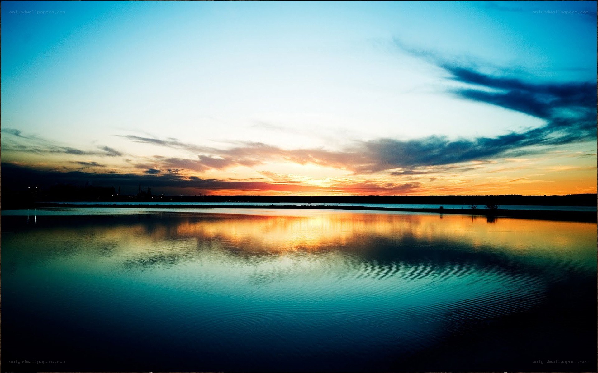 sunset over calm water