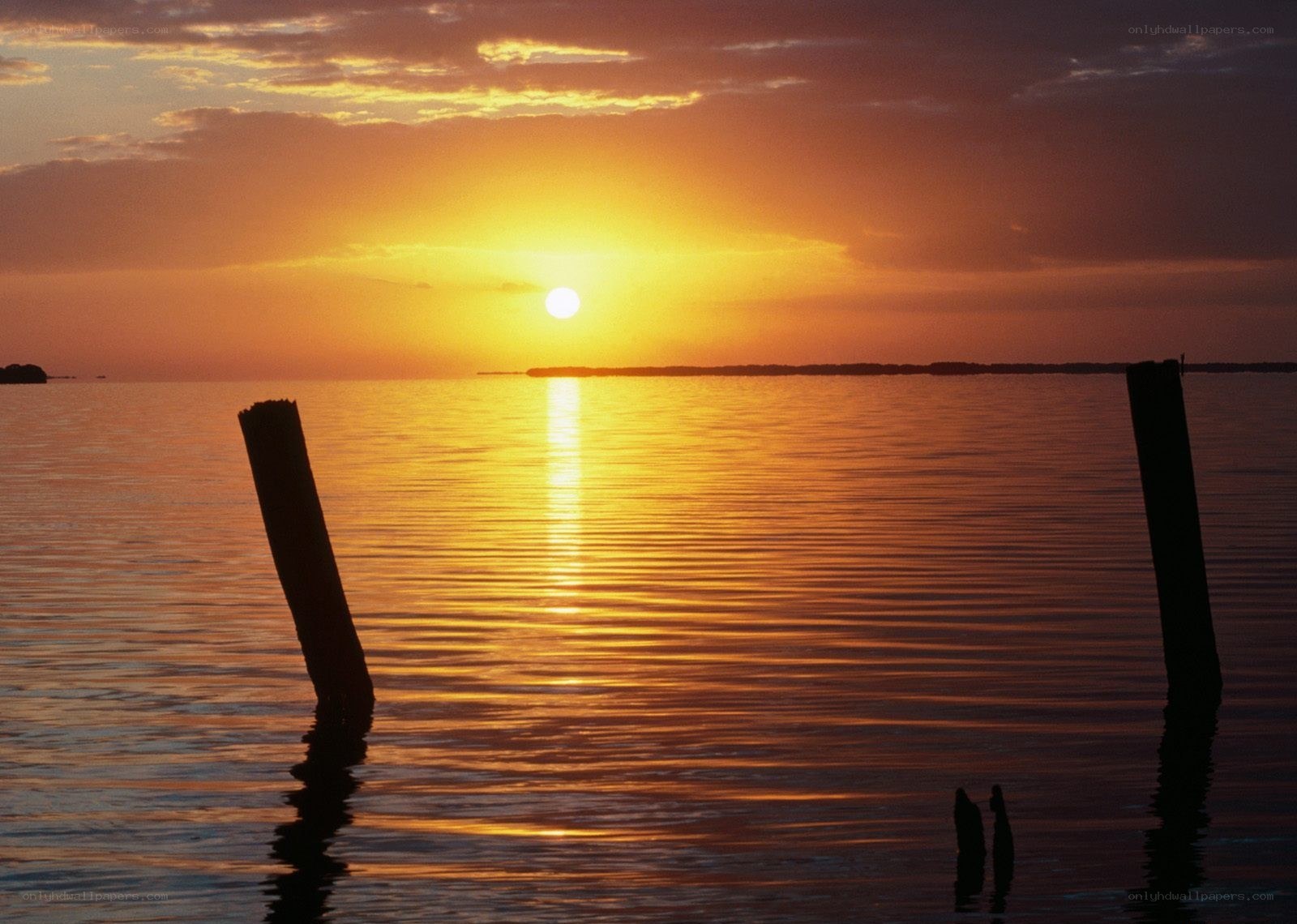 Sunset over calm water