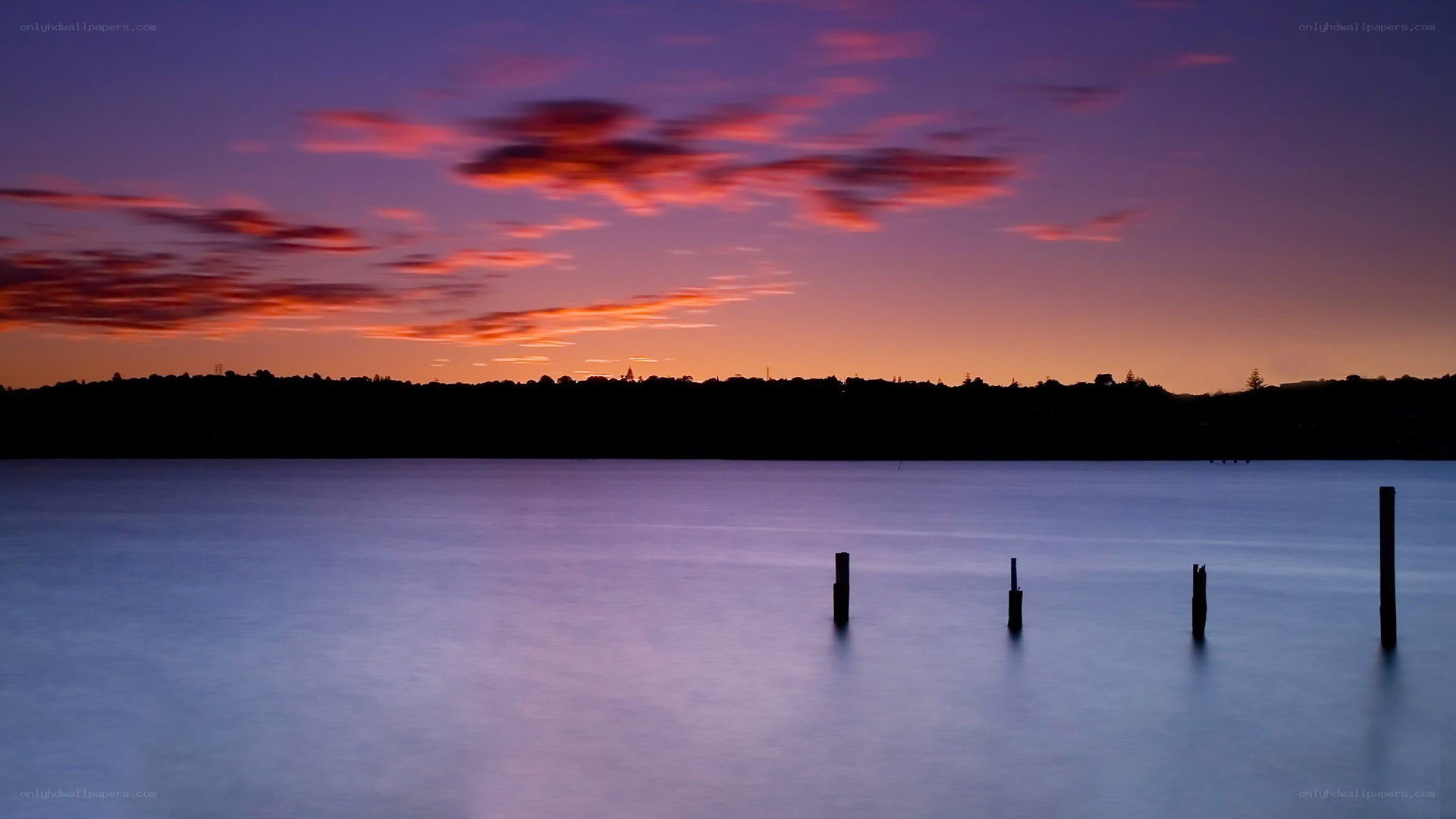 Sunset over calm water