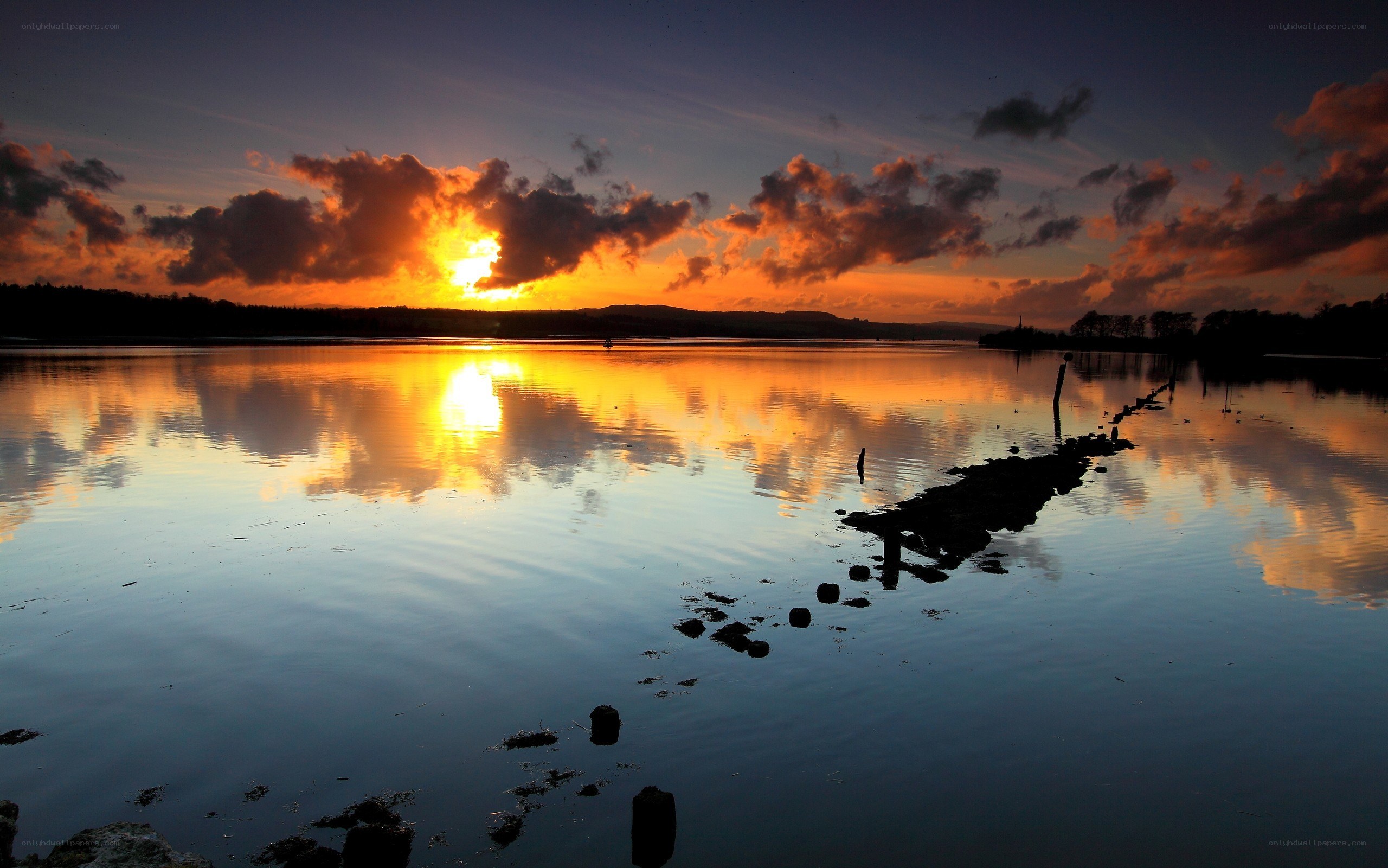 sunset over calm water