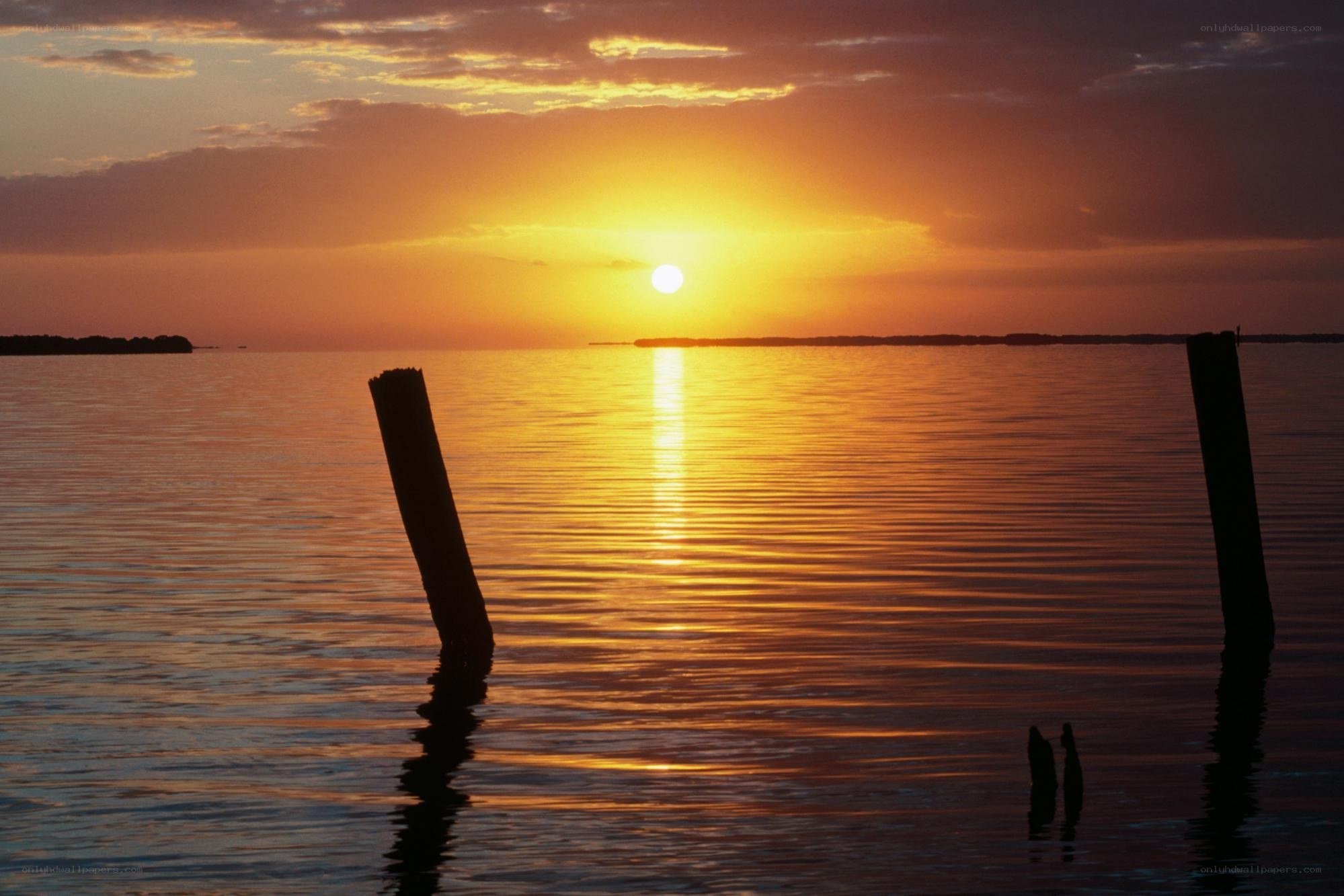 Sunset over calm water