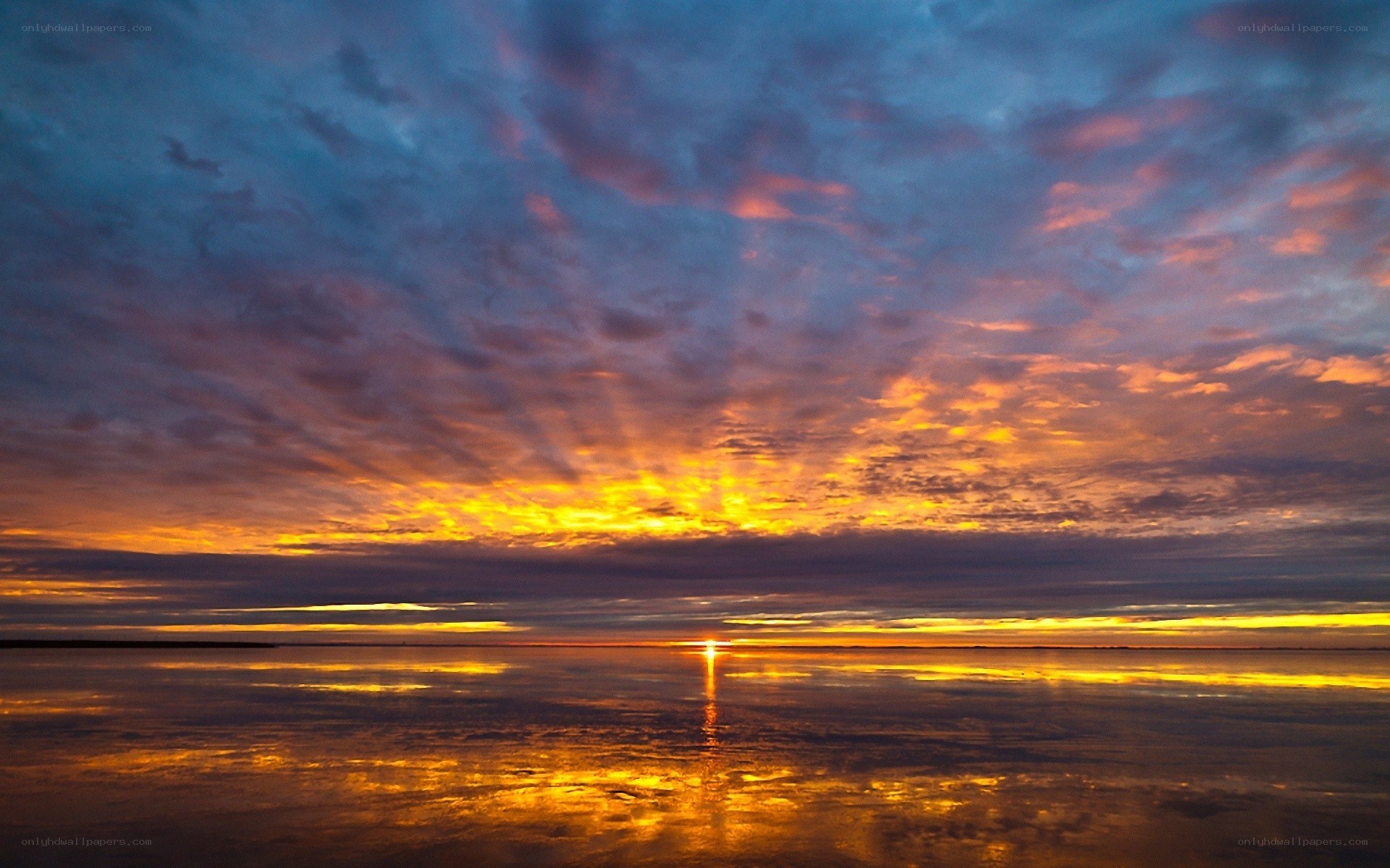 Sunset over calm water