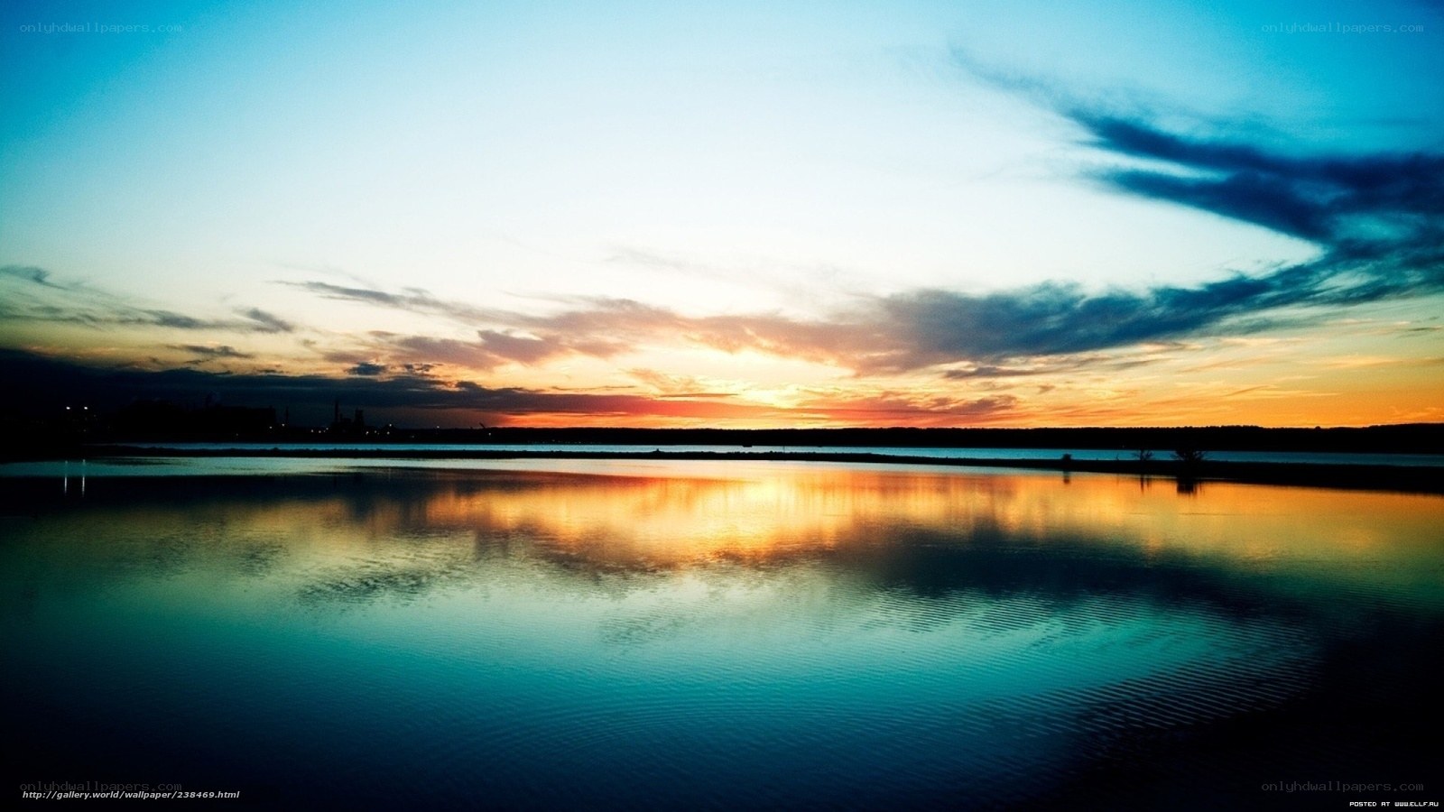 sunset over calm water