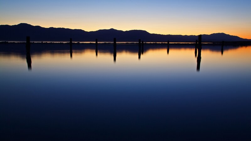 sunset over calm water