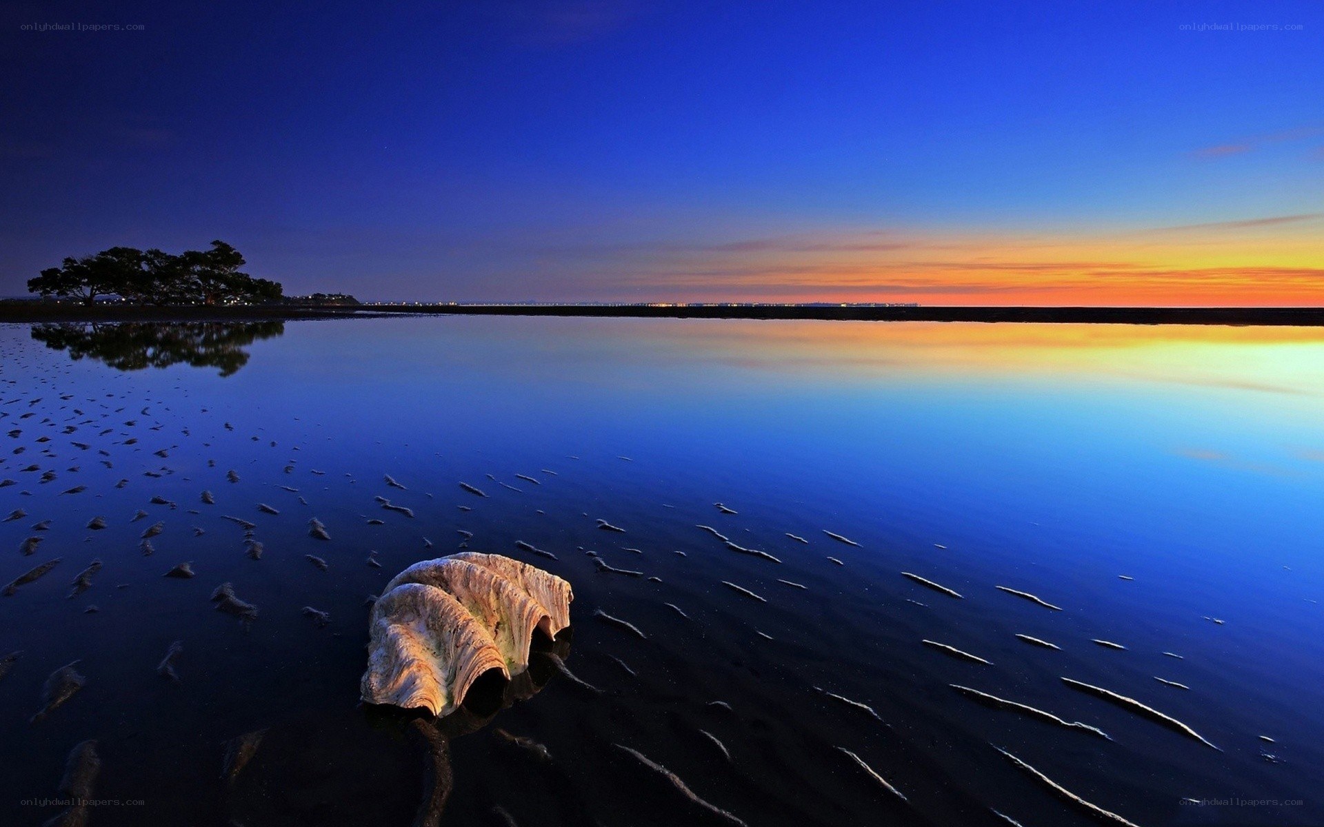 Sunset over calm water