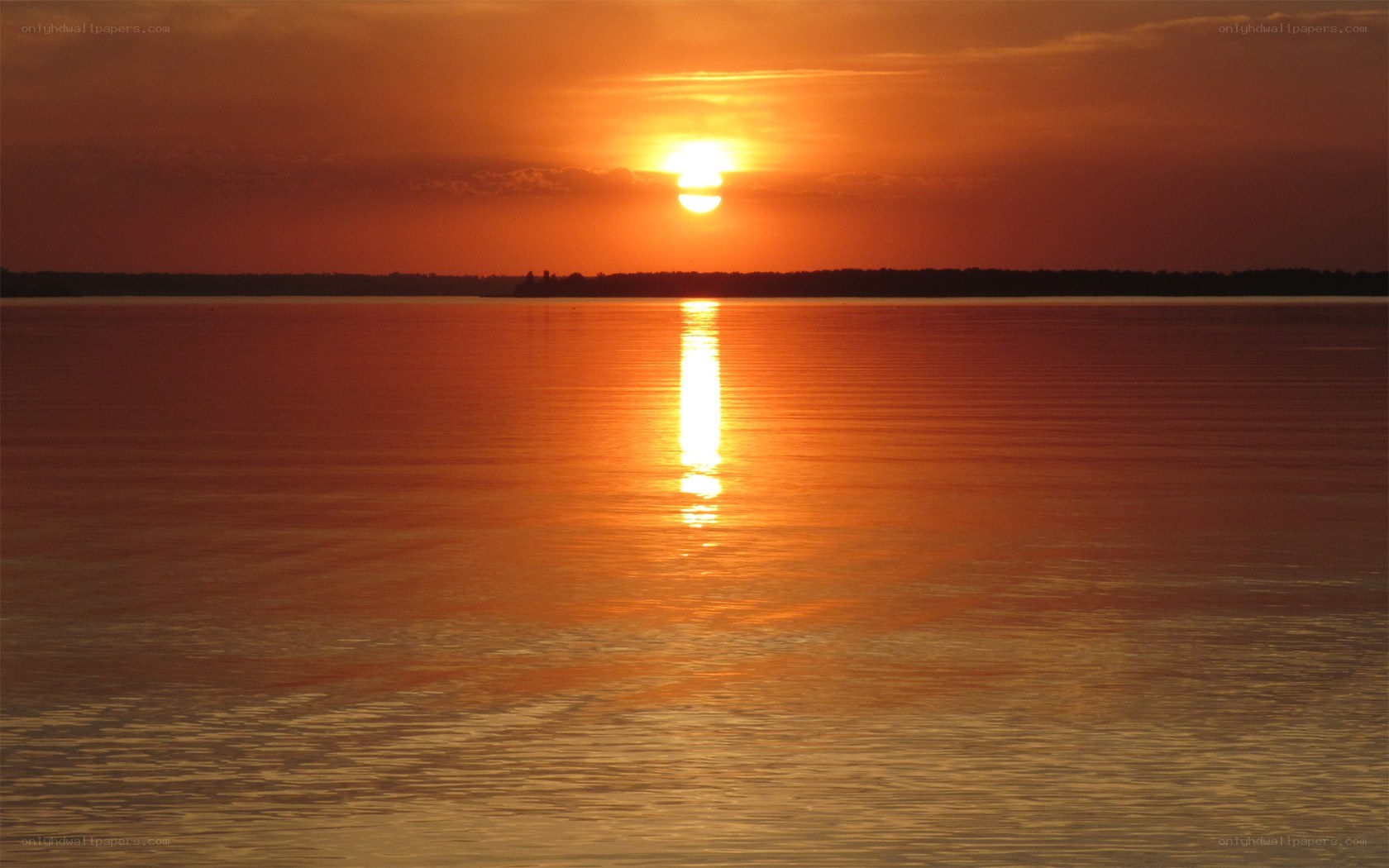 Sunset over calm water