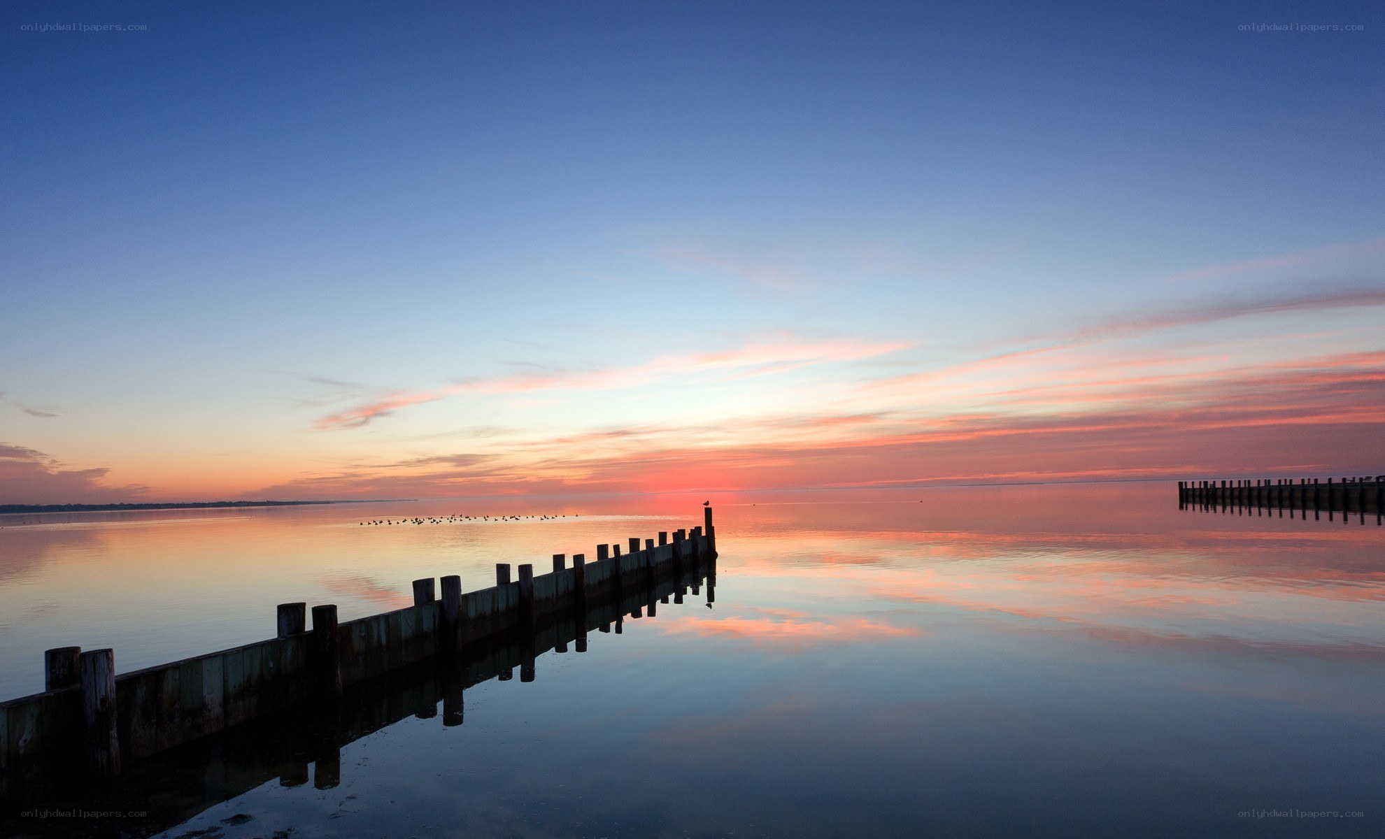 sunset over calm water
