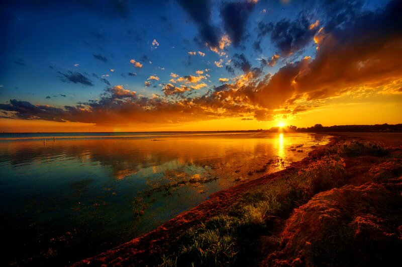 Sunset over Calm Water — Blue, Dramatic, Photograph, Clouds, Sun