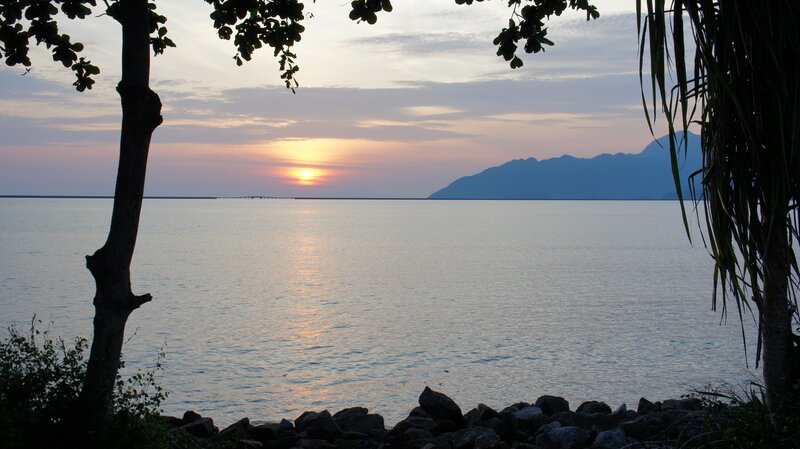 Sunset over Calm Water — Blue, Serene, Photograph, Mountain