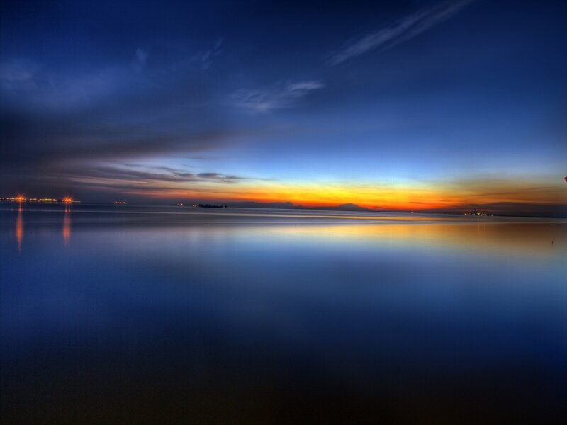 Sunset over Calm Water — Blue, Serene, Photograph, Sky, Horizon