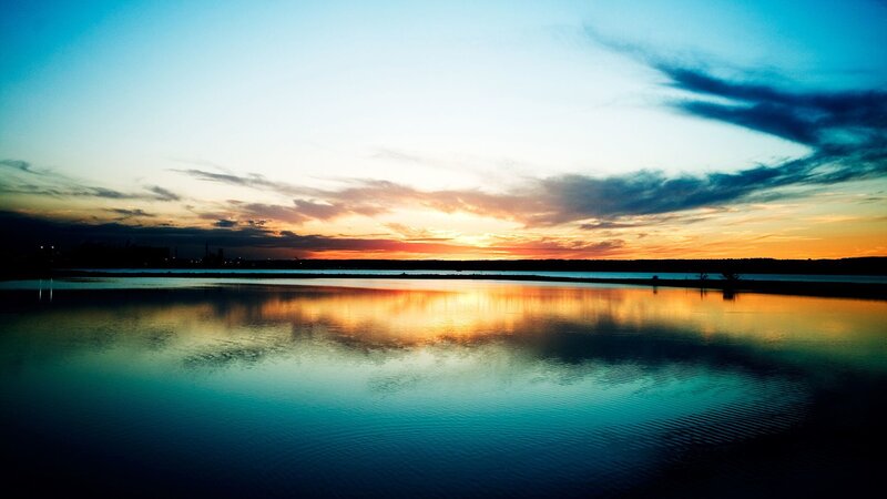 Sunset over Calm Water — Blue, Serene, Photograph